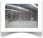 Top and bottom beams are inserted to ensure the bays are sqaured correctly before leveling and securing to the ground.