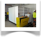 This picture shows one of the rolling filing systems near completion but still surrounded by a construction zone. Carefully taped off, the unit came through without so much as a scratch.