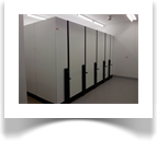 This is just one of the several rolling filing systems installed. Pearl White finish with the contrasting Gloss Black mechanical assist consuls